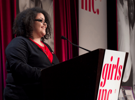 girls Inc speaking at podium