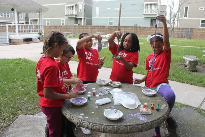 girls playing with slime